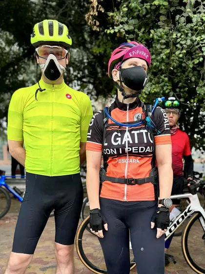 Riding with anti-pollution masks on a hazy morning. We ride in all conditions, always prioritizing safety.