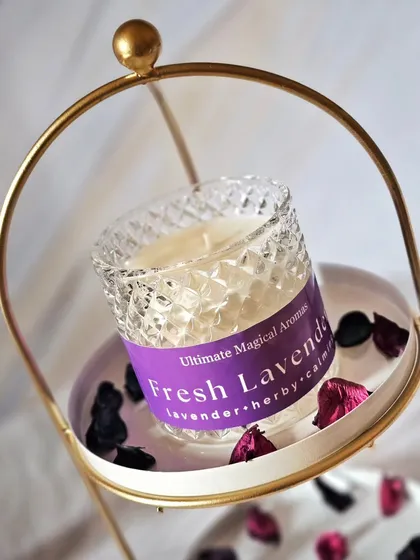 My 'Fresh Lavender' Crystal Jar Candle, elegantly presented. The combination of the calming scent and the sparkling jar makes it a perfect piece for your sanctuary.