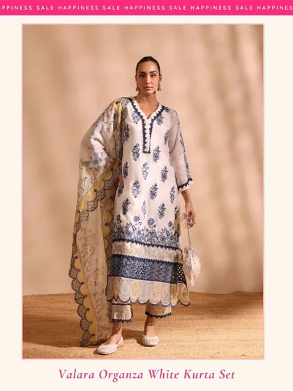 Another amazing deal is the Valara Organza White Kurta Set. The classic white and blue combination is timeless, and it comes with a beautiful scalloped dupatta to complete the look.