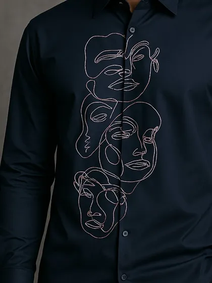 A close-up view of the continuous line art embroidery. This detail shot highlights the fluidity and complexity of the handcrafted design.