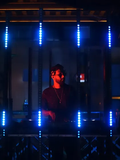 A duplicate of the focused shot framed by blue lights.