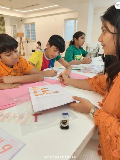 Our instructor provides one-on-one feedback, helping students refine their technique and understand the nuances of letter formation.