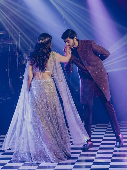 A classic, romantic gesture that makes every heart melt. This moment from their sangeet dance was straight out of a fairytale.