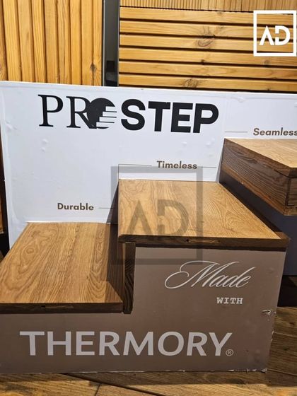 A close-up of the 'Pre-Step' wooden staircase solution I offer. It's a durable, timeless, and seamless system that elevates the look of any staircase.