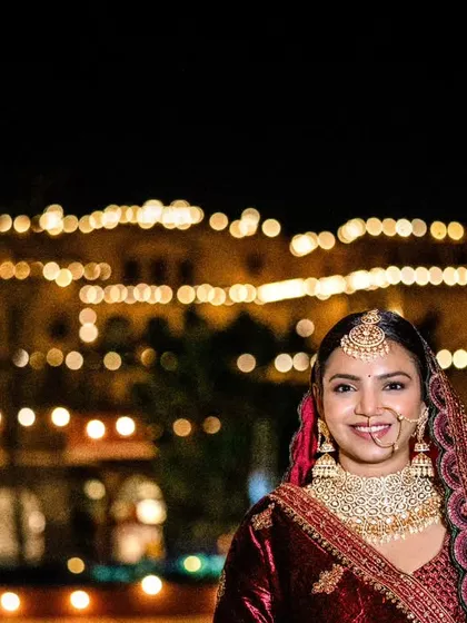 A destination wedding at Tijara Fort Palace, with the bride shining as brightly as the lights of the palace behind her. I use the location's magic to create breathtaking portraits that tell a story of romance and grandeur.