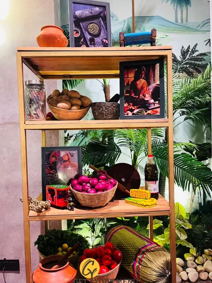 Another example of our themed decor, this time for a rustic or farm-to-table concept, using fresh produce and traditional Indian elements.