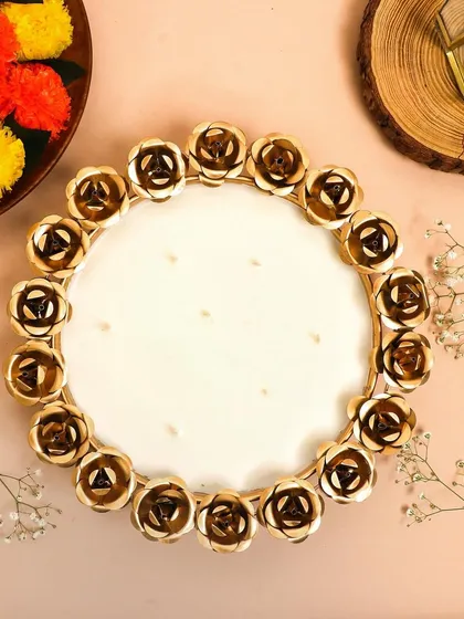 A top-down view of the beautiful Rose Candle Bowl, unlit, showcasing the clean soy wax and the detailed rose border.