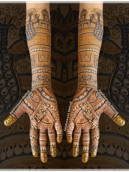 A classic bridal design with peacocks and architectural motifs on the arms. The palms feature a dense, intricate pattern for a complete bridal look.