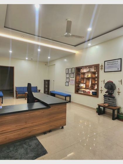 A full view of our reception and waiting area. We designed this space to be welcoming and peaceful, a place where you can transition calmly from the outside world into your practice.