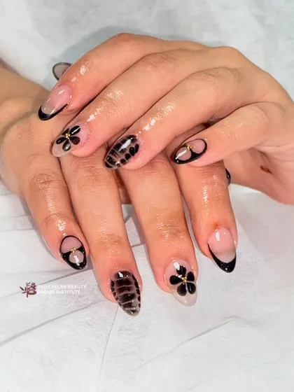 Another view of the mixed-media black floral set, showing how the different patterns and textures work together to create a cohesive, stylish look.