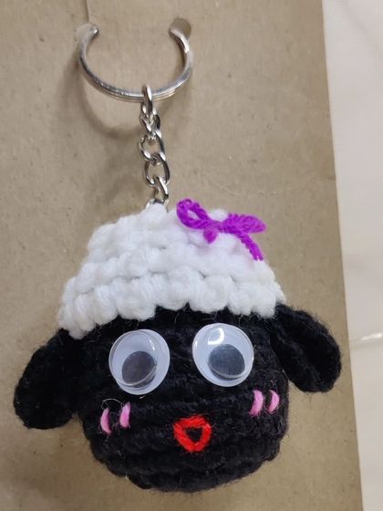 Shaun the Sheep keychains. I make them as a couple, one with a little bow, perfect for you and your bestie.