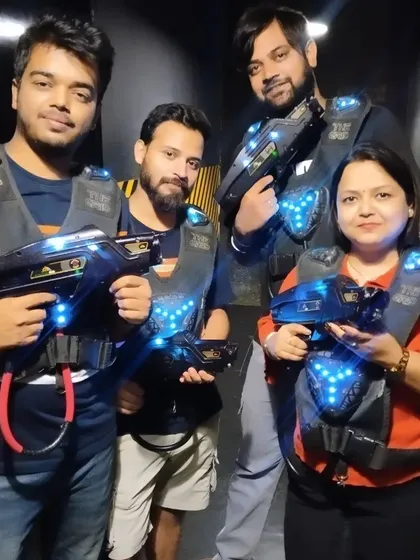 A duplicate of image 67, showing a squad enjoying a game of laser tag.