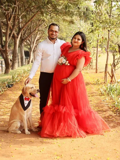 A beautiful family portrait with their well-dressed Labrador. Including pets makes the session so much more personal and memorable.
