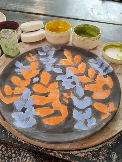 A duplicate image showing the base colors applied to the plate.
