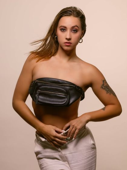 Another angle from this conceptual shoot, showing the model's pose and the unique way the accessory is worn.