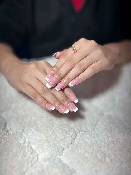 You can never go wrong with a classic. Here, I’ve shaped the nails into a clean square and applied a timeless French tip, a perfect example of simple, elegant gel nail extensions.