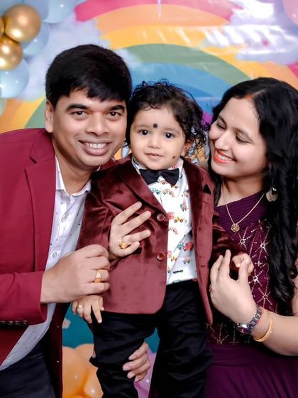 A vibrant 'Pokemon' themed birthday party, with character cutouts, a custom backdrop of the Kanto region, and red and white balloons, ready for a Pokemon battle.