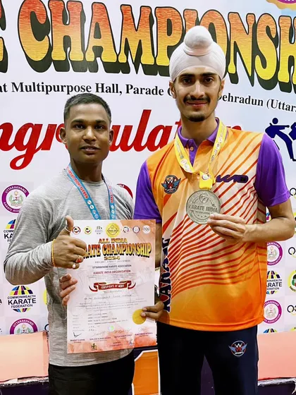 Another shot with my coach after the national championship. His guidance is invaluable in helping me analyze my performance and plan for the future.