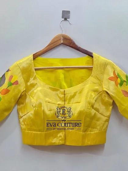Front view of the yellow Paithani blouse.