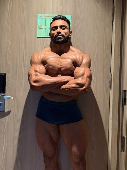 Arms crossed, feeling strong and ready.