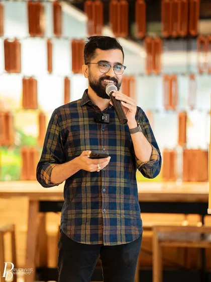 A performer engages the audience while speaking on "Vulnerabilities". The theme led to a deeply connecting and empathetic session.