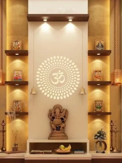 A beautifully lit pooja unit featuring a backlit Om mandala that provides a soft, ambient glow. The design includes multiple shelves with individual accent lights for displaying smaller idols and frames.