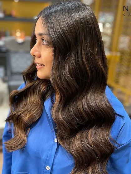 A side view of this stunning balayage, highlighting the beautiful colour transition and the healthy shine of the hair.