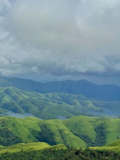 A beautiful landscape shot of the rolling green hills of Gangadikal.