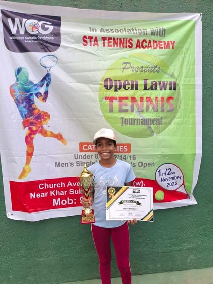 Here is our promising young player, Liticia Fernandes, proudly holding her winner's trophy and certificate at the Open Lawn Tennis Tournament. Her grit and determination are an inspiration.