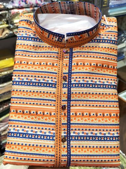 An orange and blue striped and patterned kurta, another festive option from my exclusive Diwali collection.