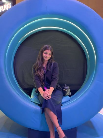 Having some fun at one of the creative installations at the Jio World Centre during the summit.