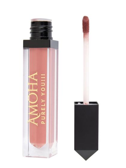 An open tube of nude 'Amoha' lipstick, isolated on white.
