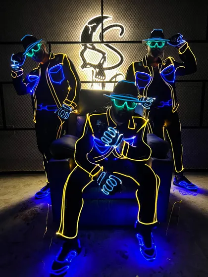A cool pose in our 'Bhool Bhulaiyaa' inspired costumes, complete with glowing glasses. We love recreating iconic looks with our own LED twist.