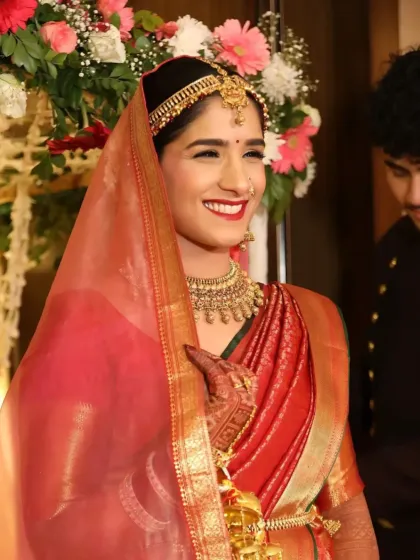 A candid shot of the bride during the ceremony. Her makeup is subtle and elegant, allowing her to look and feel her best during the most important moments.
