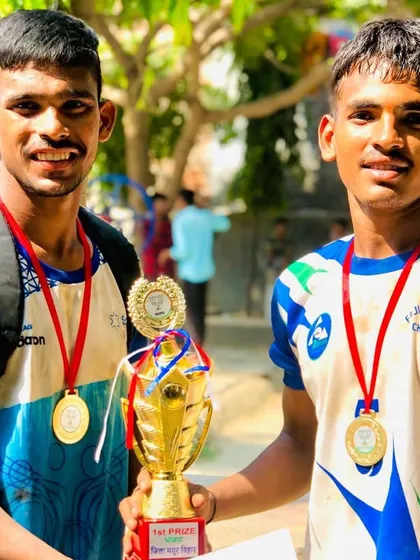 Two of our smiling players after winning a local tournament.
