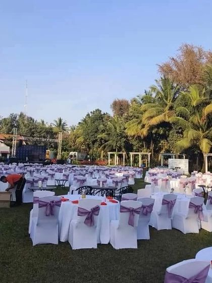 The calm before the storm. This shows the seating arrangement for a large outdoor gala, ready for guests to arrive and the party to begin. I can cater to events of any scale.