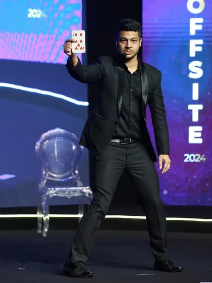 A powerful moment on stage at the Hike Offsite event. Card magic is a classic for a reason, and I love giving it a modern, high-impact twist for a corporate audience.