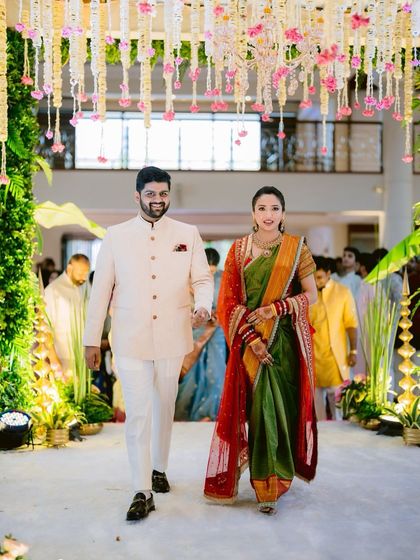 The grand entrance. This couple looks so regal, and I was honored to style the bride's hair for her special day, creating a look that was both elegant and timeless.