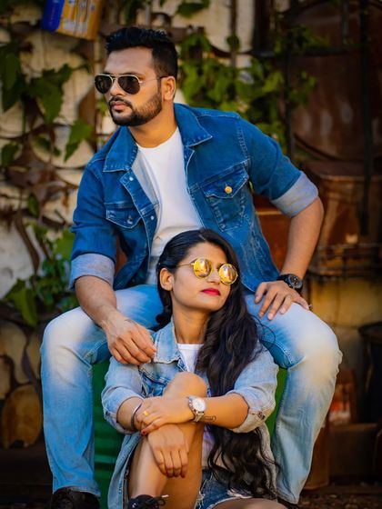 A stylish portrait of a couple in a rugged, industrial setting. This showcases our ability to create fashionable, magazine-style pre-wedding photos.