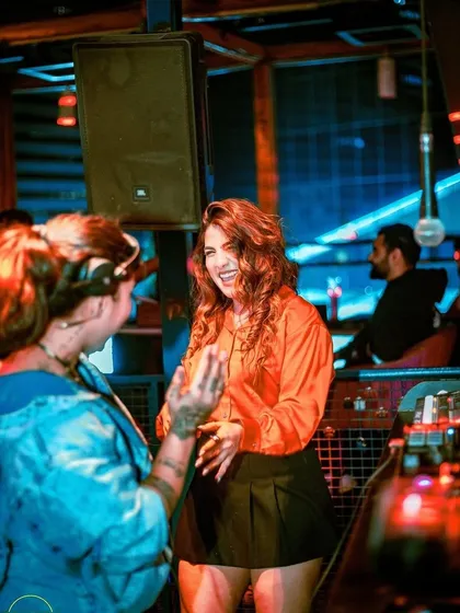 Sharing a laugh with a friend or fan at Toyboy Advant.