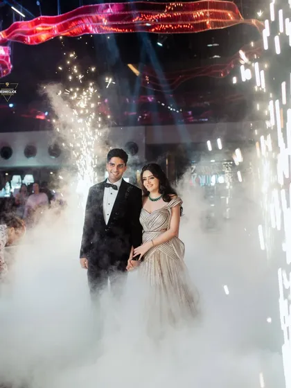Making a grand entrance into their forever. I love capturing the energy of a reception, with sparklers, smoke, and a couple ready to celebrate their love with everyone they hold dear.