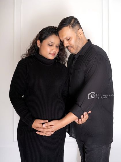 A tender pose showing the strong connection between the expecting parents. These simple, emotional shots are a beautiful part of any maternity session.