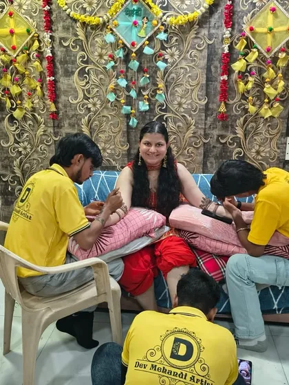 Our professional team at a client's home, ensuring everyone gets beautiful mehndi for the celebration. We can handle group bookings for parties and functions anywhere in Mumbai.
