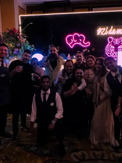 The best nights end with happy clients who feel like family. Here's our team celebrating a successful sangeet party with the guests. Seeing these smiles is why we do what we do.