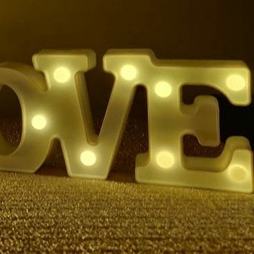 Our light-up marquee letters are a client favorite. They add a warm, personal glow to any setting and are perfect for spelling out names, initials, or romantic words like 'LOVE'.