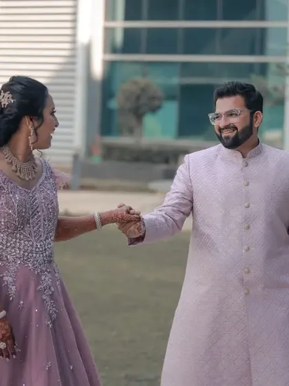 A closer shot of the "palat" moment, focusing on their happy expressions and the hand-in-hand connection.