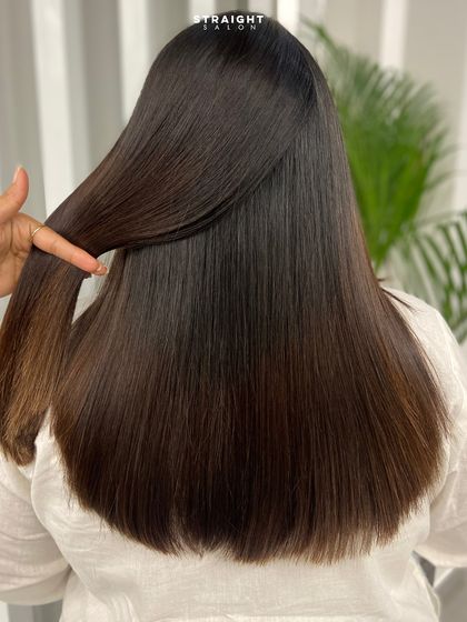 The goal is always glass-like shine and silky perfection. This is the immediate result of one of my signature hair smoothening treatments.