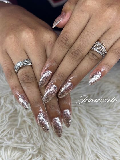You can never have too much glitter! This is a full set of stunning, sparkling silver glitter nails that are perfect for any party.