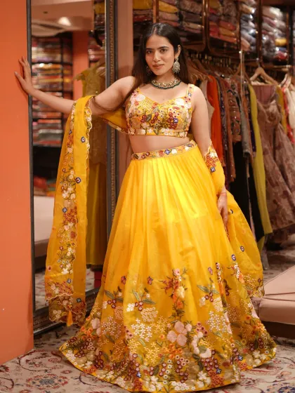 Your Haldi look should be as bright and happy as the occasion itself. This vibrant yellow lehenga with floral embroidery is just perfect for a sun-kissed celebration with your loved ones.
