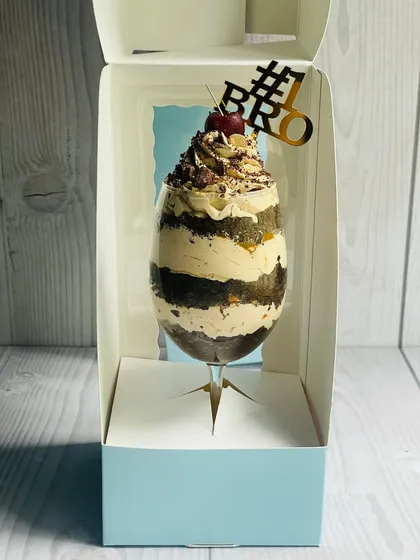 My Mocha Mirage Delight, created specially for Rakhi. It's an elegant dessert glass layered with chocolate cake, coffee mousse, almond praline, caramel, and chocolate chunks.